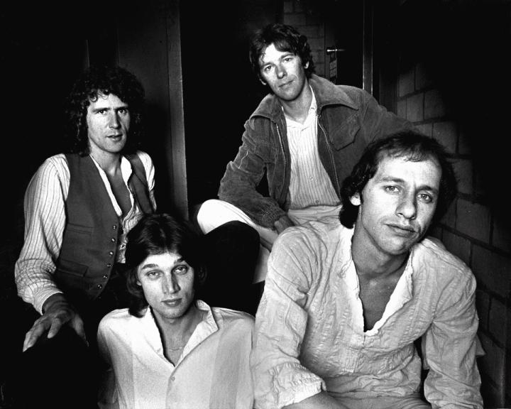 Front: David (L) and Mark Knopfler.  Rear: John Illsley (L) and Pick Withers
